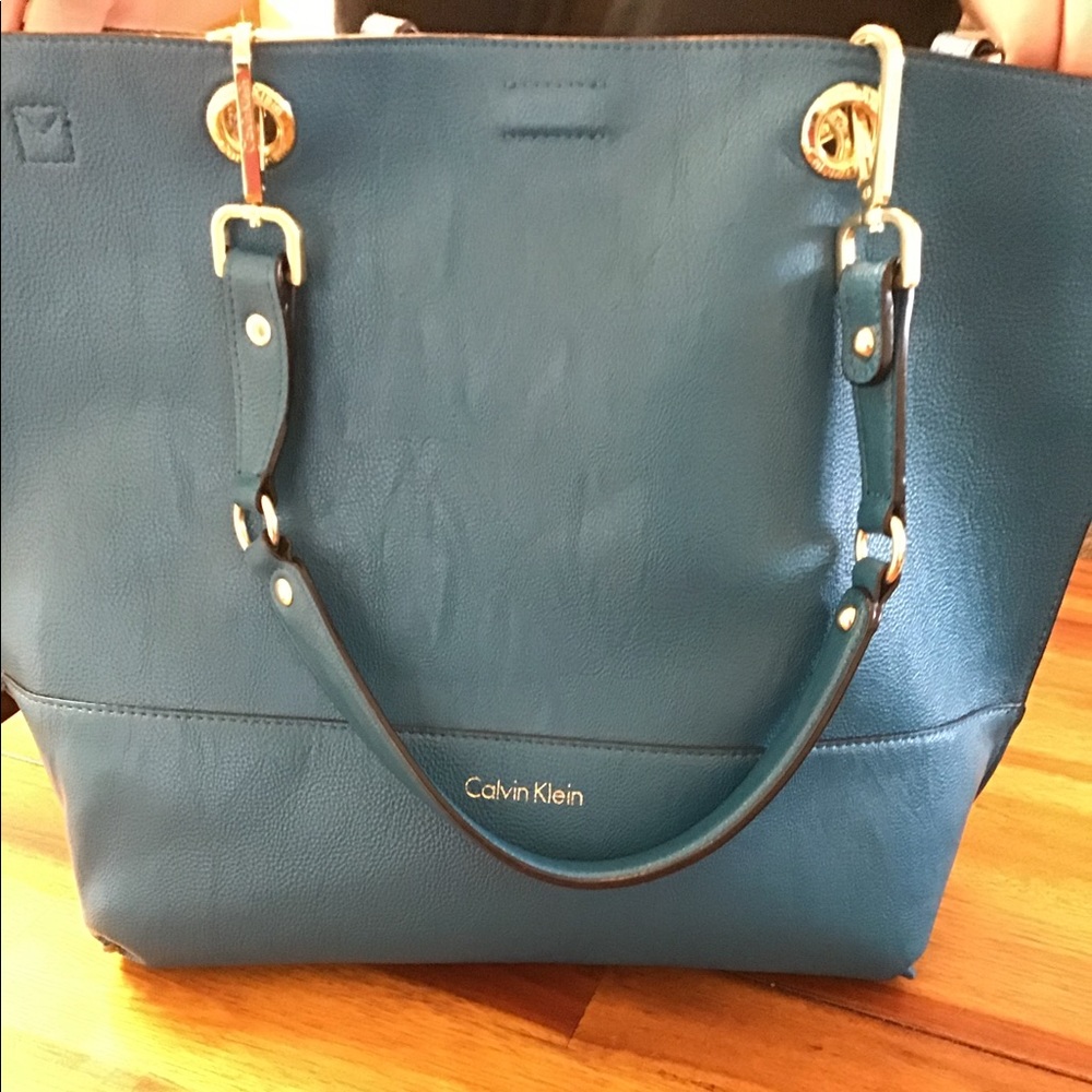Brand new reversible CalvinKlein tote bag/wristlet